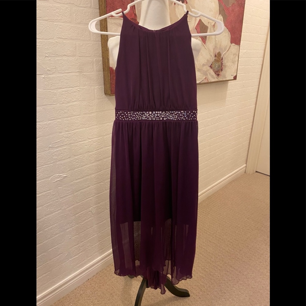 Girls beautiful purple formal dress. So cute.